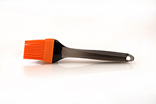 Velká silikonová mašlovačka BergHOFF Geminis - délka 22 cm - oranžová